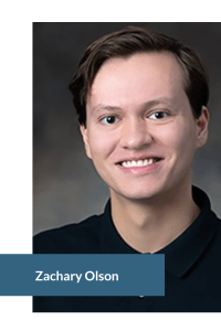 Portrait of a smiling person with brown hair against a gray background.
